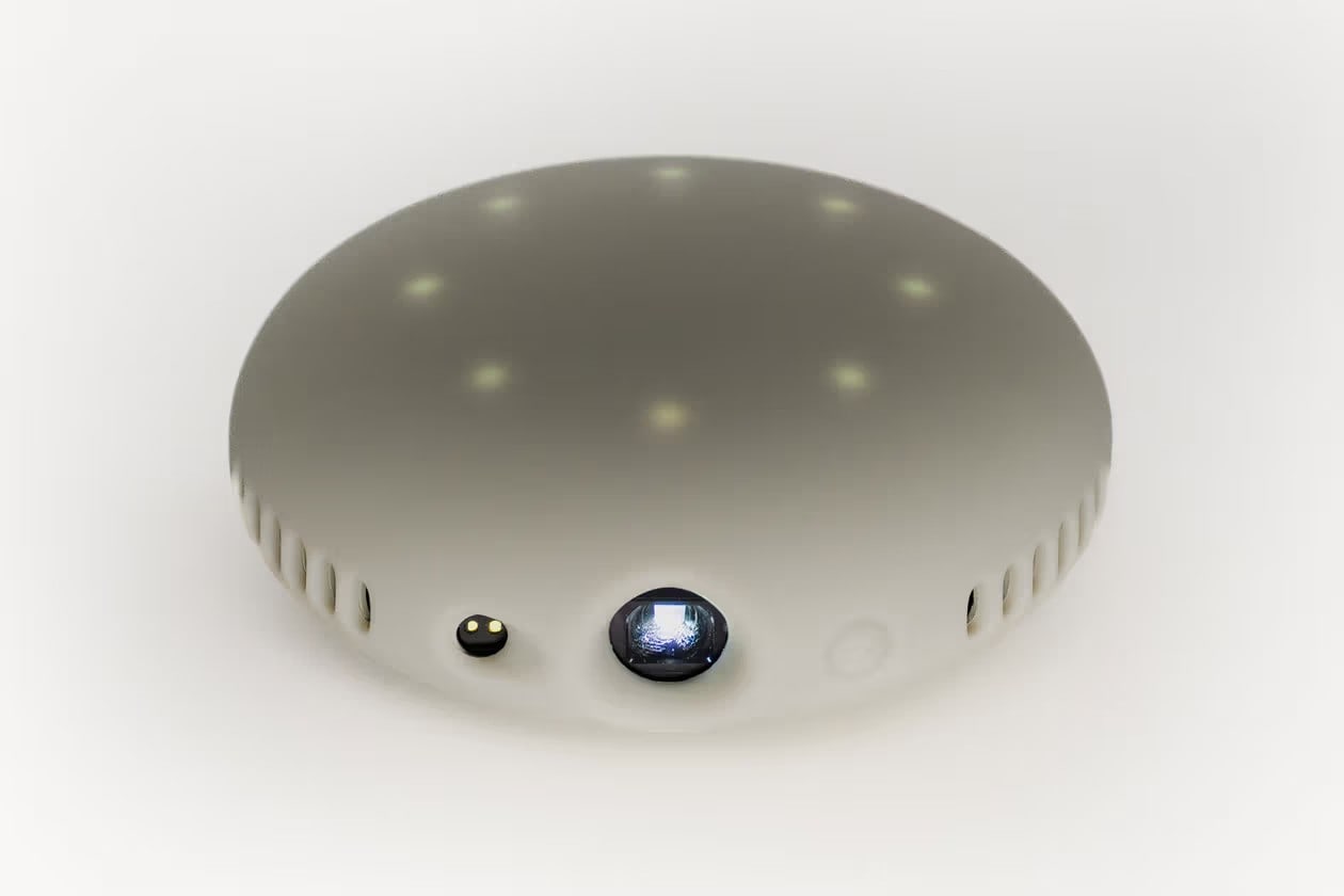 the Stem Projector: the lens, the ring of lights, and the vents