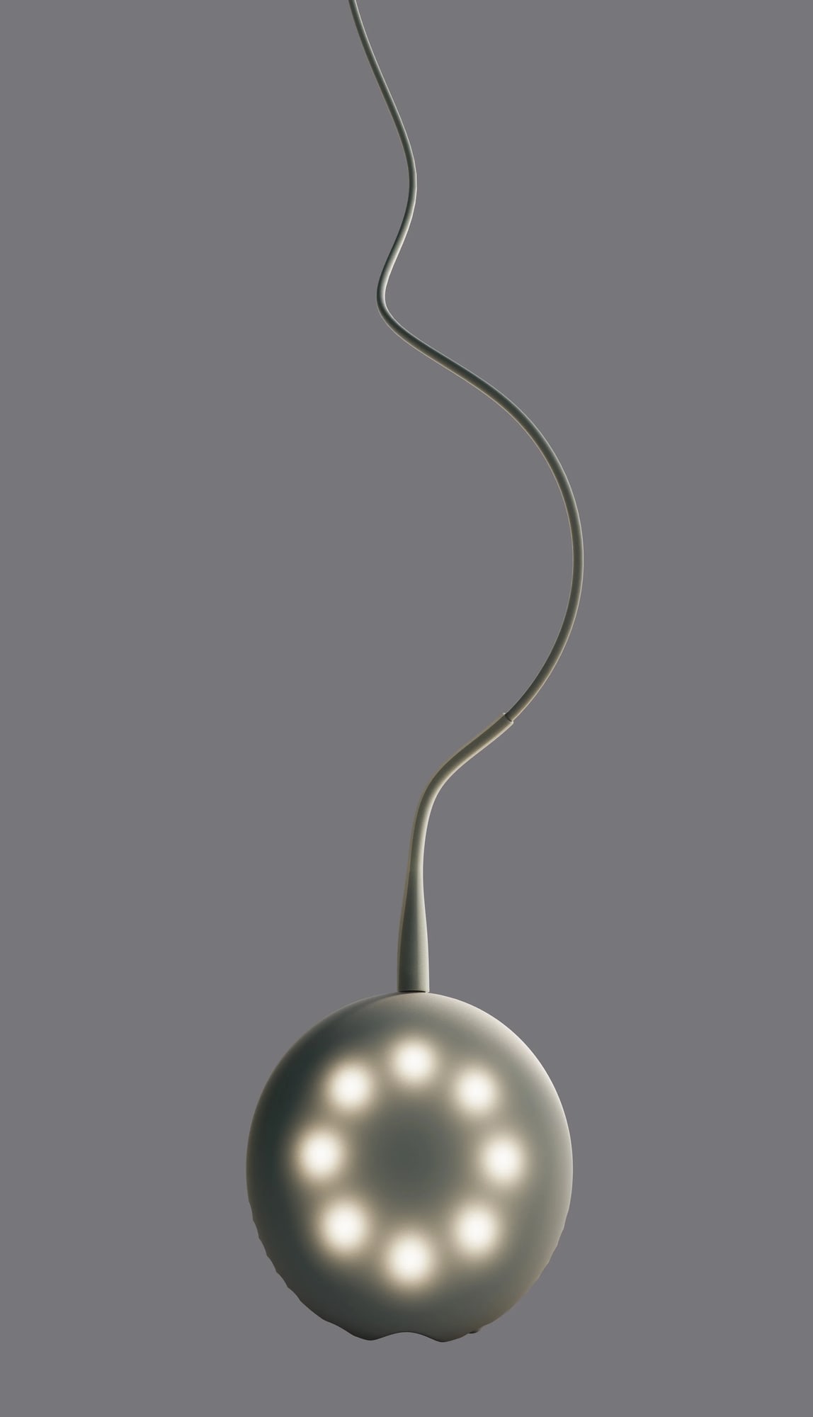 the Stem Projector hanging from its cable, its ring of lights on
